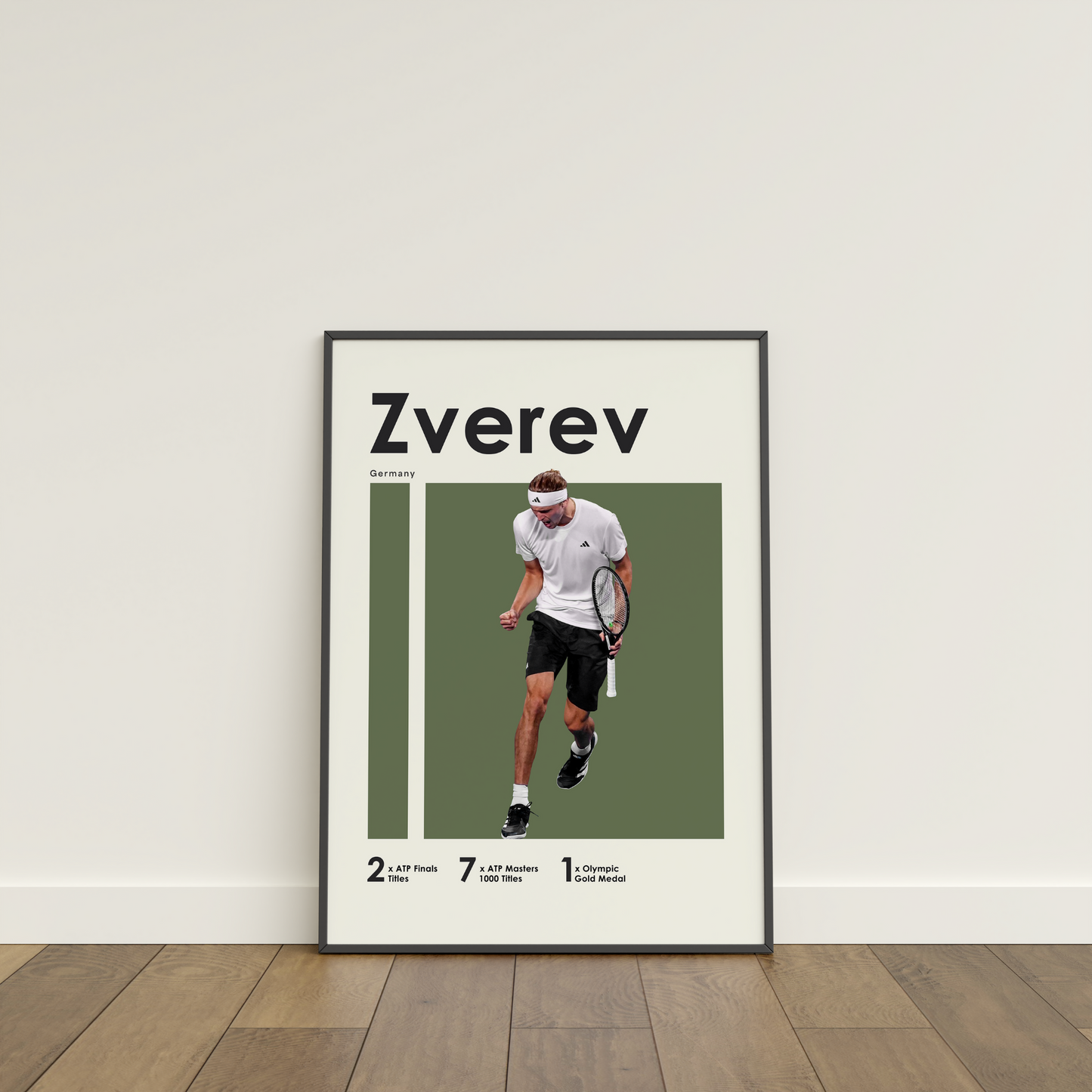 framed poster mockup leaning on a white wall. poster of tennis player Alexander Zverev celebrating.