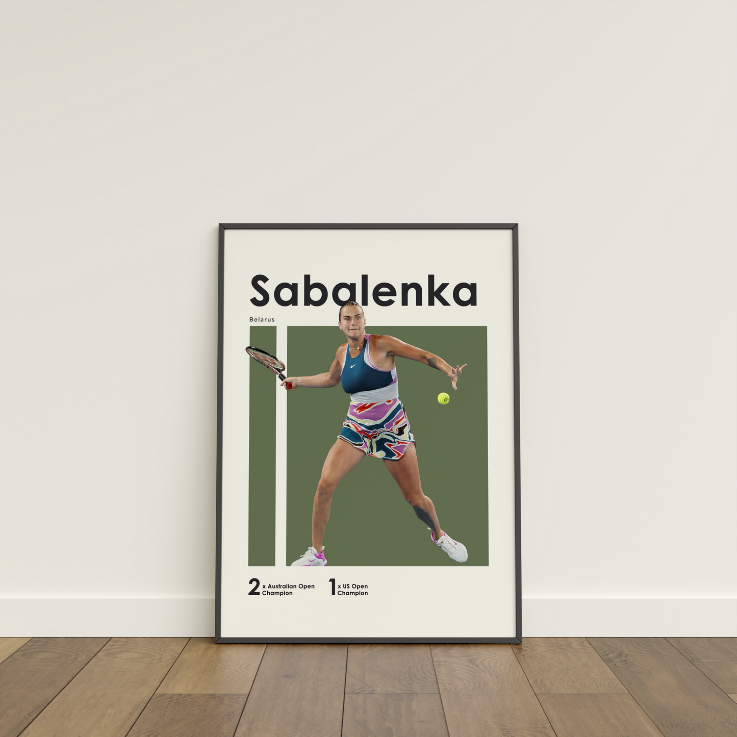 framed poster mockup leaning on a white wall. poster of tennis player Aryna Sabalenka hitting a forehand.