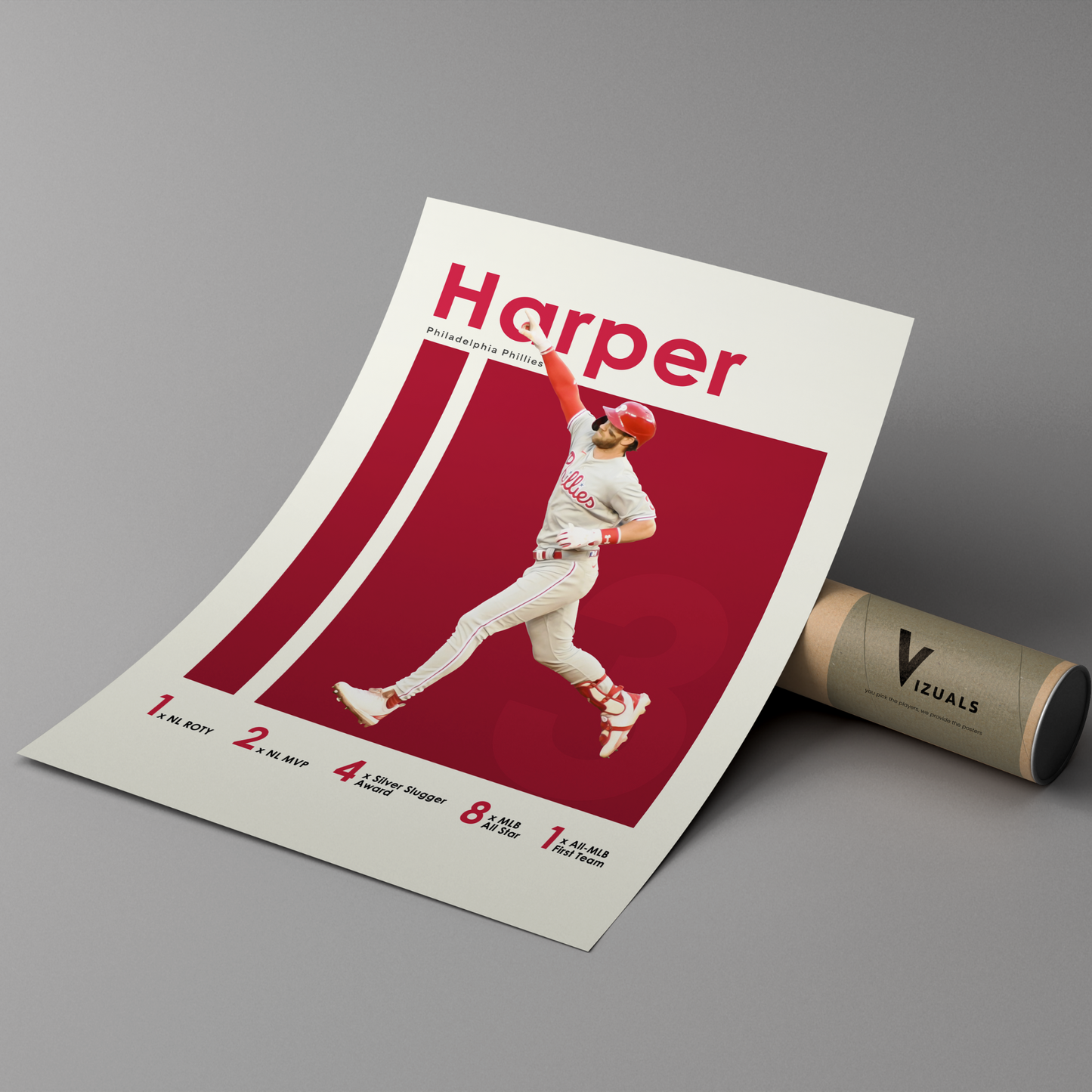 poster mockup leaning on a branded cardboard tube. poster of baseball player bryce harper celebrating for the Philadelphia Phillies.