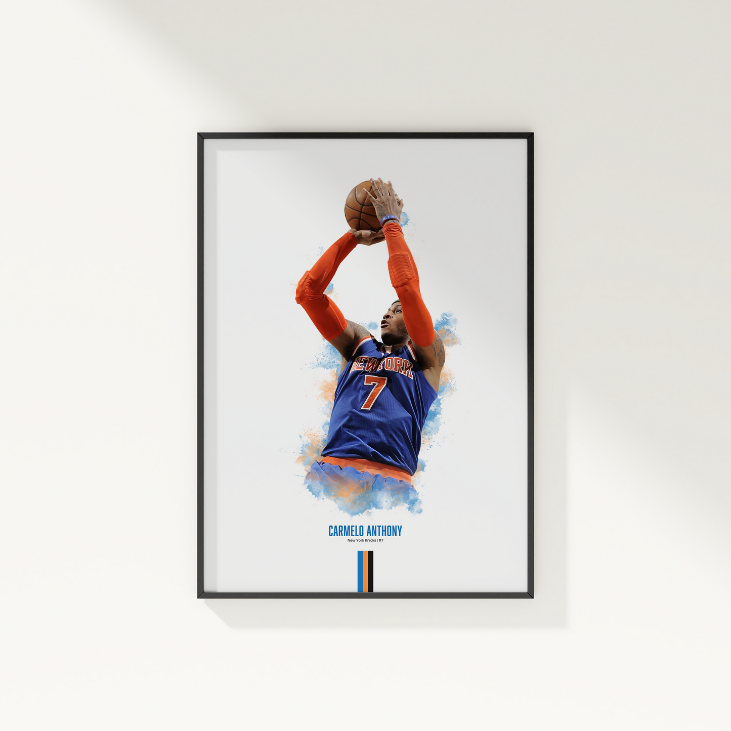 framed poster mockup hanging on a white wall. poster of basketball player carmelo anthony shooting for the new york knicks.