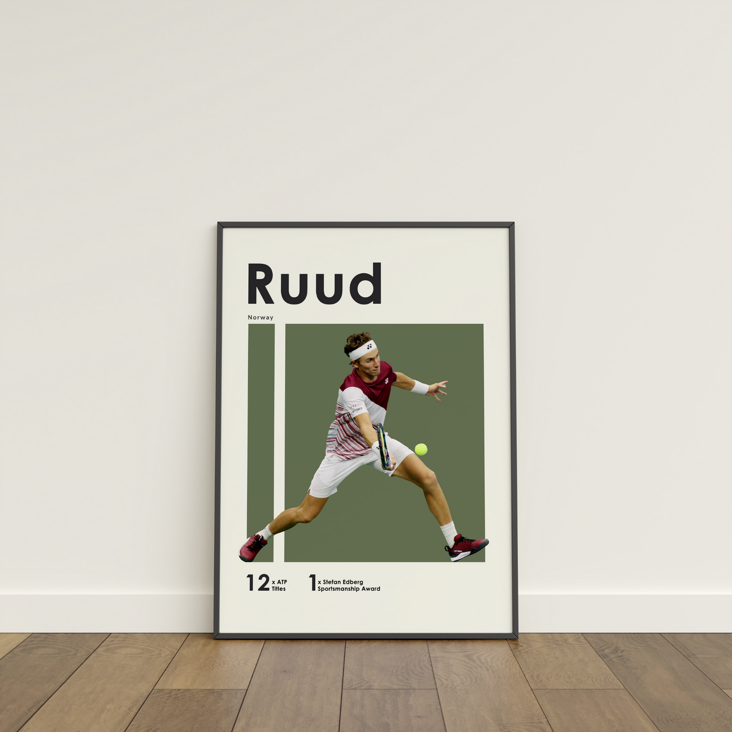 framed poster mockup leaning on a white wall. poster of tennis player Casper Ruud hitting a volley.