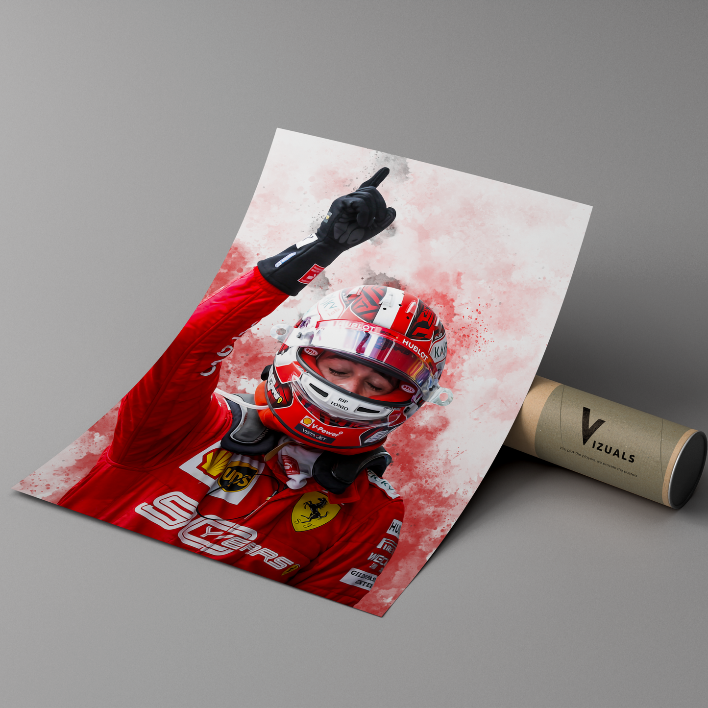 poster mockup leaning on a branded cardboard tube. poster of formula 1 driver charles leclerc celebrating for ferrari.