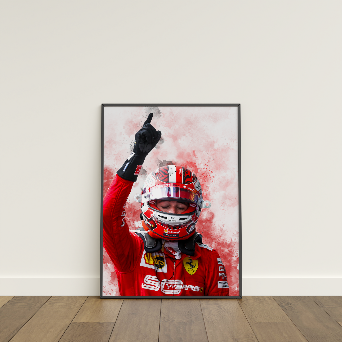 framed poster mockup leaning on a white wall. poster of formula 1 driver charles leclerc celebrating for ferrari.