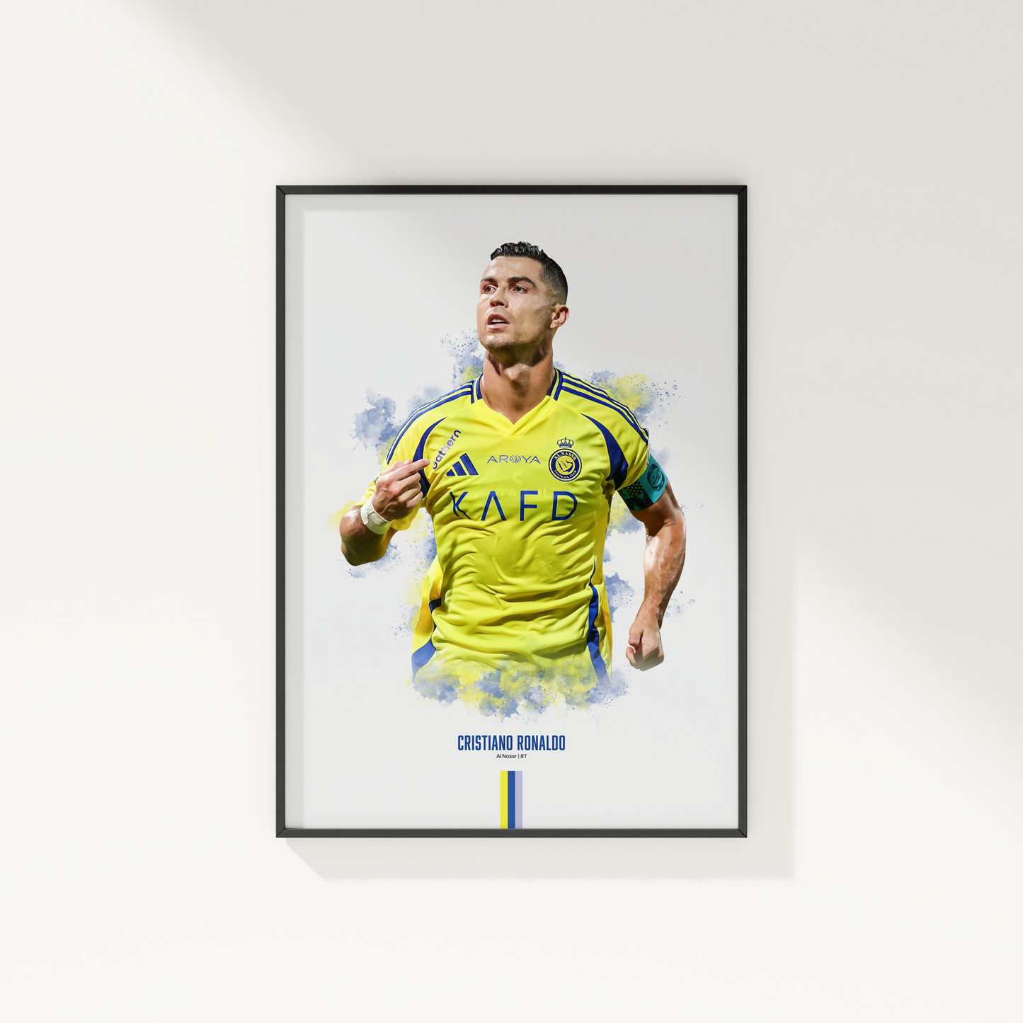 framed poster mockup hanging on a white wall. poster of soccer player cristiano ronaldo celebrating for Al Nassr.