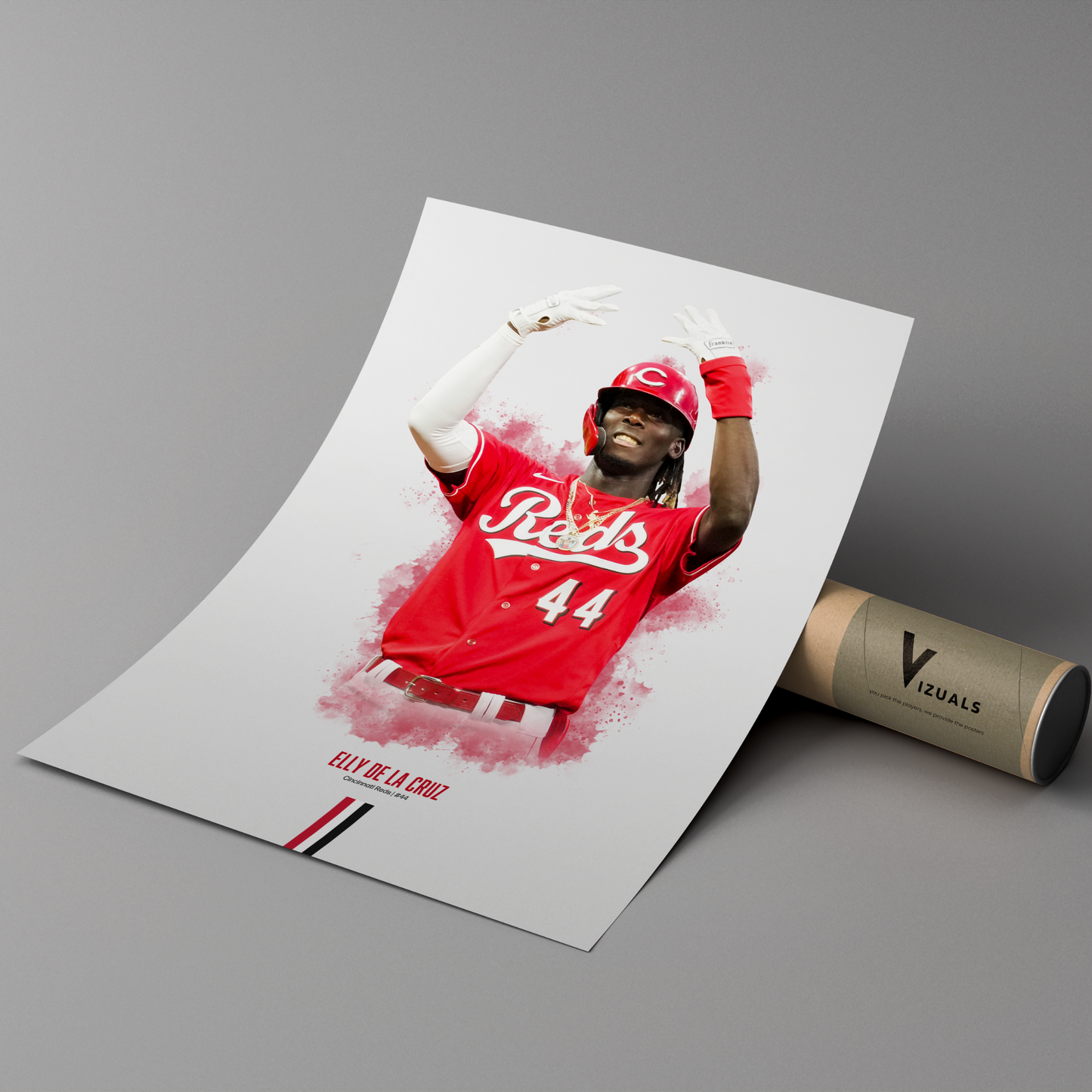 poster mockup leaning on a branded cardboard tube. poster of baseball player elly de la cruz celebrating for the cincinnati reds.