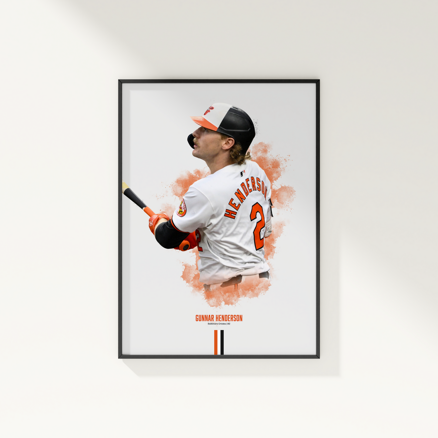 framed poster mockup hanging on a white wall. poster of baseball player gunnar henderson playing for the baltimore orioles.