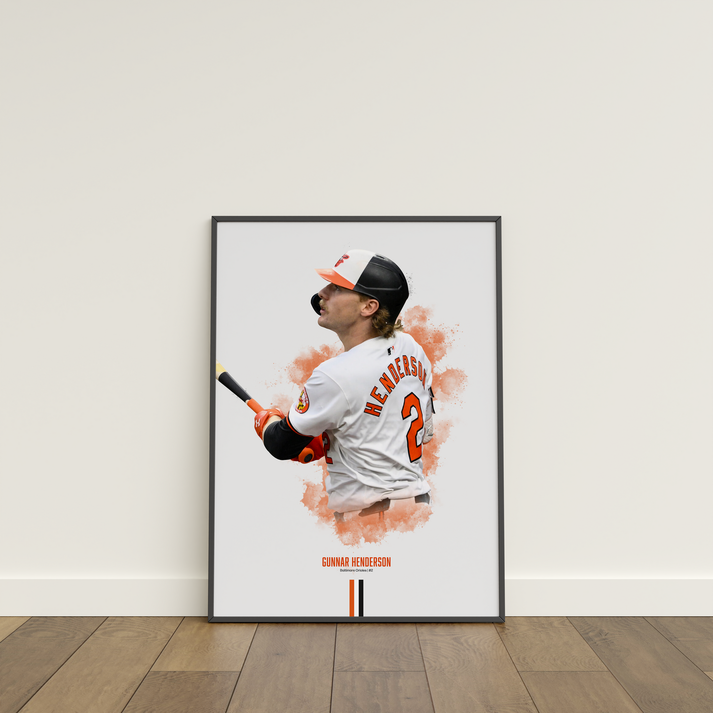 framed poster mockup leaning on a white wall. poster of baseball player gunnar henderson playing for the baltimore orioles.