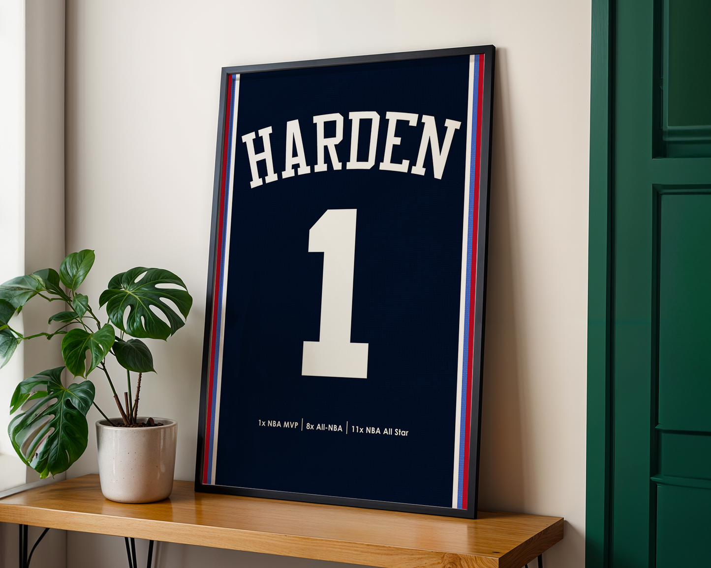 Framed sports jersey with 'Harden' and number '1' on a wooden shelf.