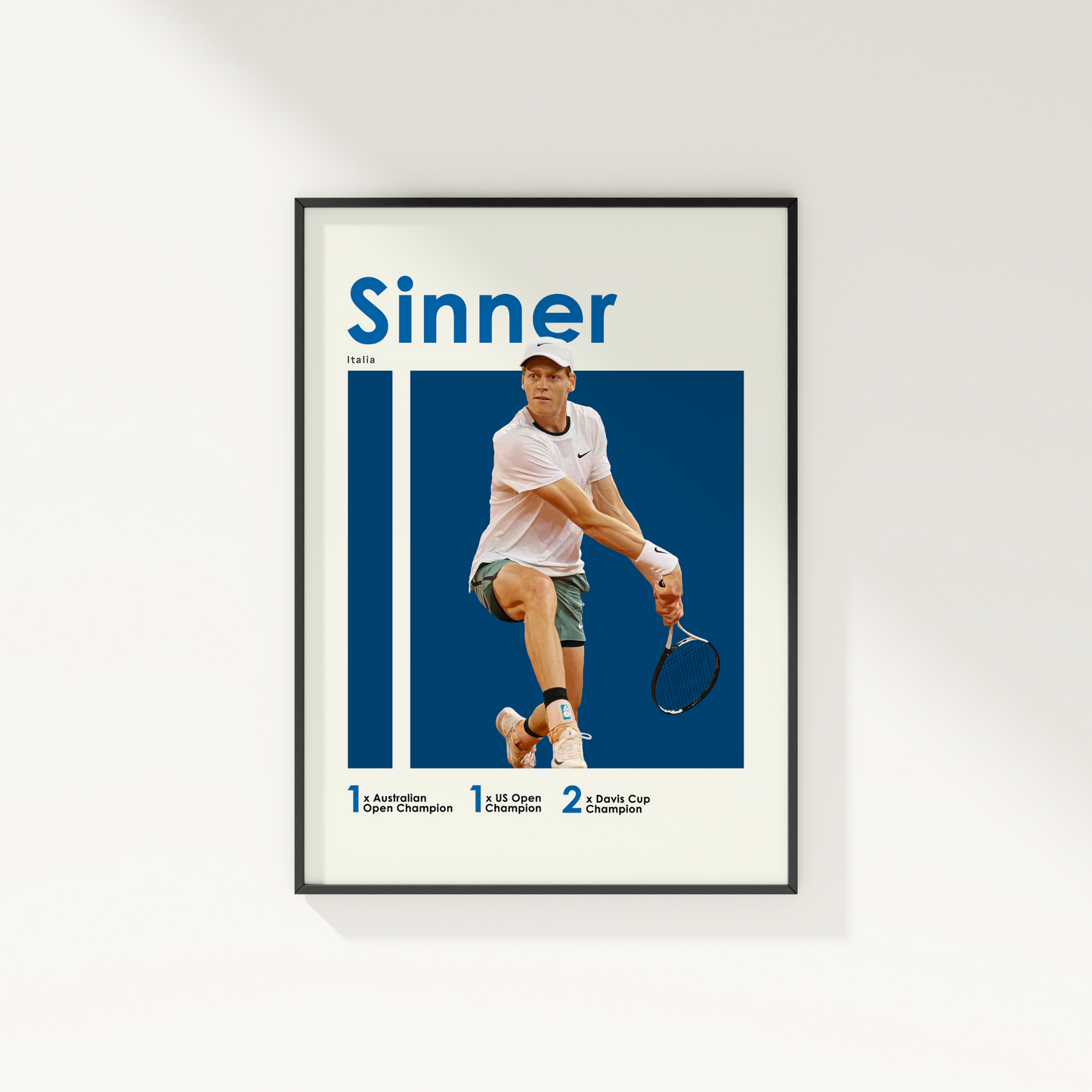 framed poster mockup hanging on a white wall. poster of tennis player jannik sinner.