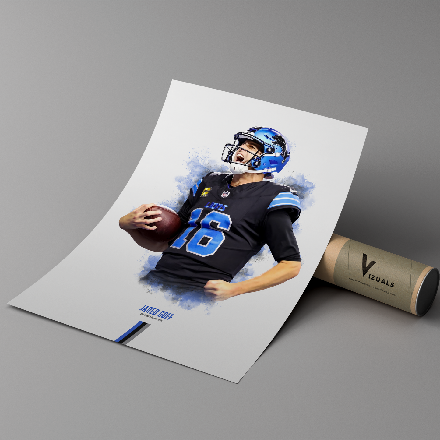 poster mockup leaning on a branded cardboard tube. poster of football player jared goff celebrating for the detroit lions.