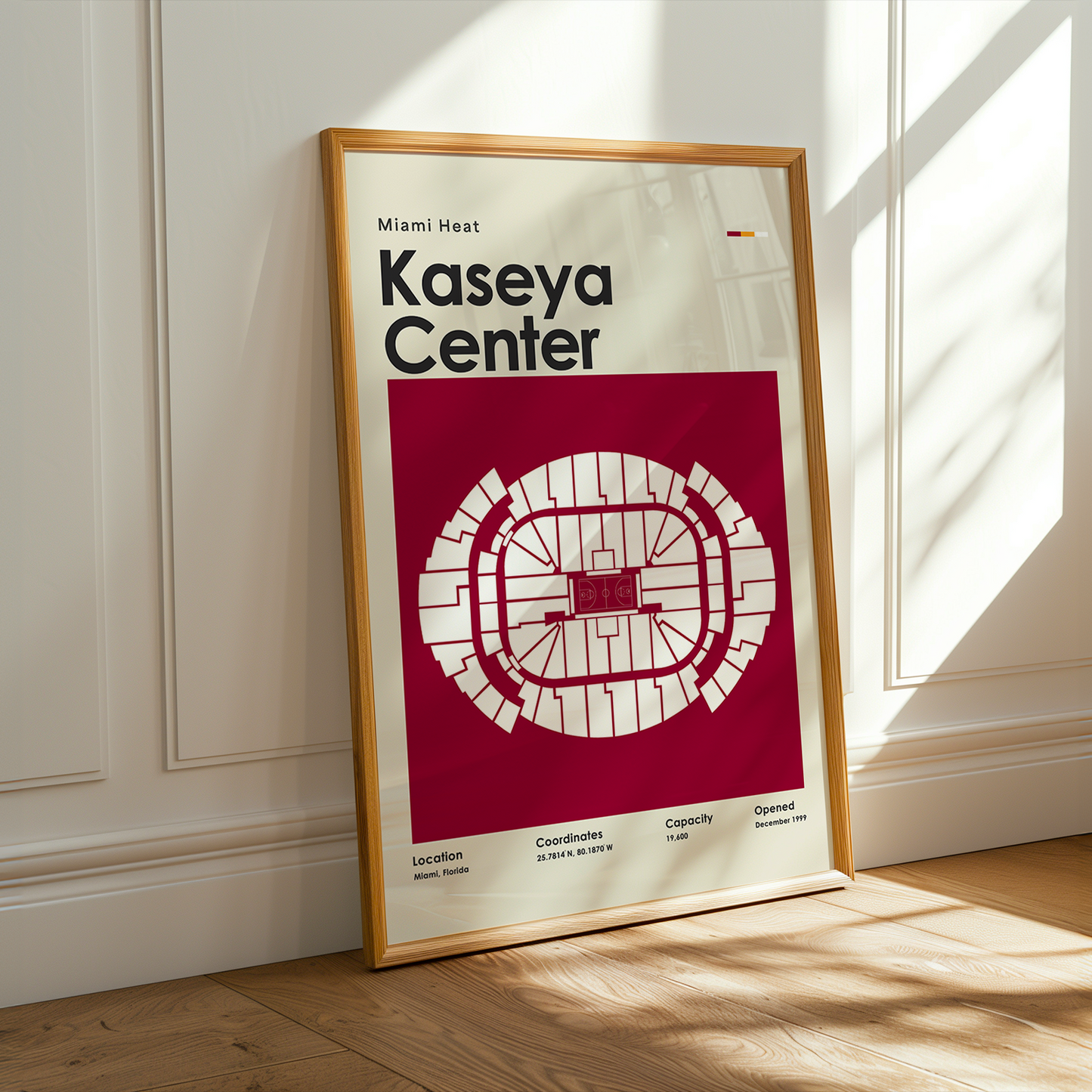 Framed poster of Kaseya Center with Miami Heat branding on a wall.