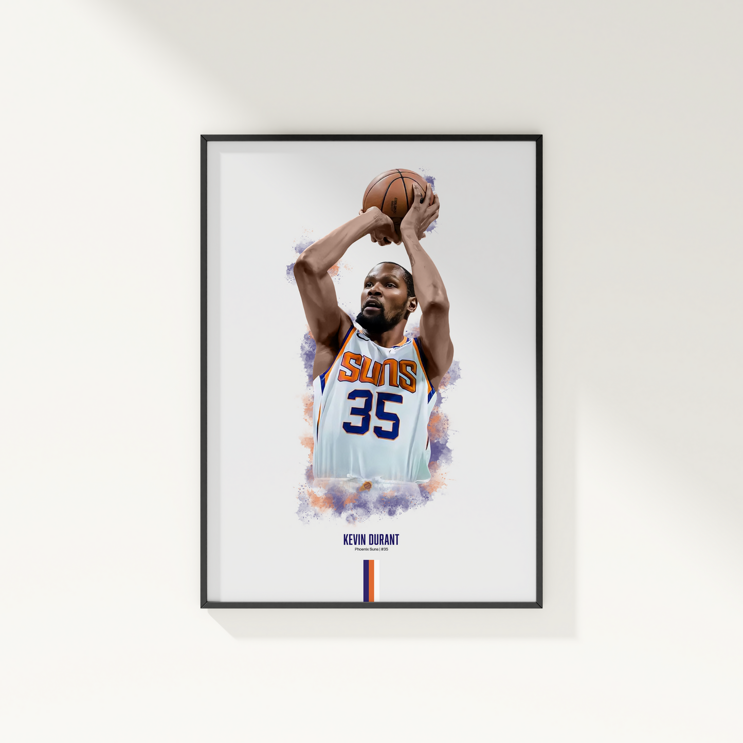 framed poster mockup hanging on a white wall. poster of basketball player kevin durant shooting for the phoenix suns.
