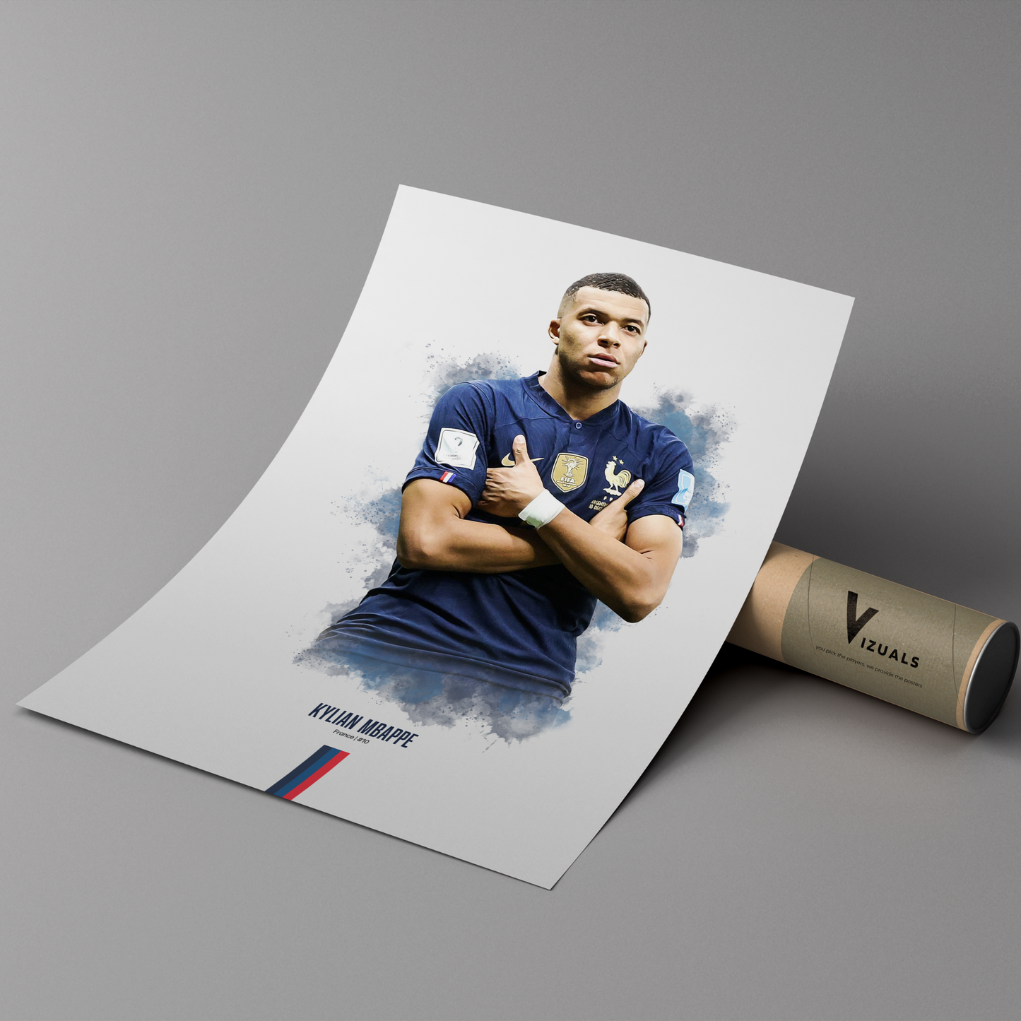 poster mockup leaning on a branded cardboard tube. poster of soccer player Kylian Mbappe celebrating for France.