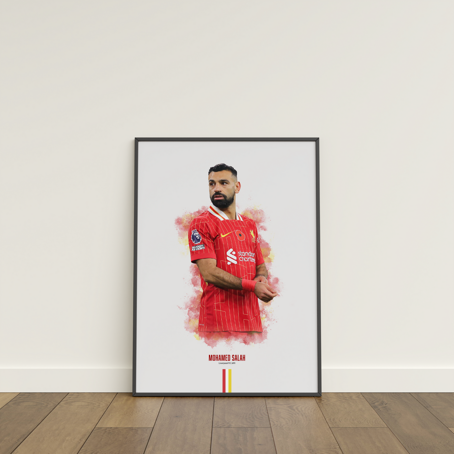 framed poster mockup leaning on a white wall. poster of soccer player mohamed salah playing for Liverpool fc.