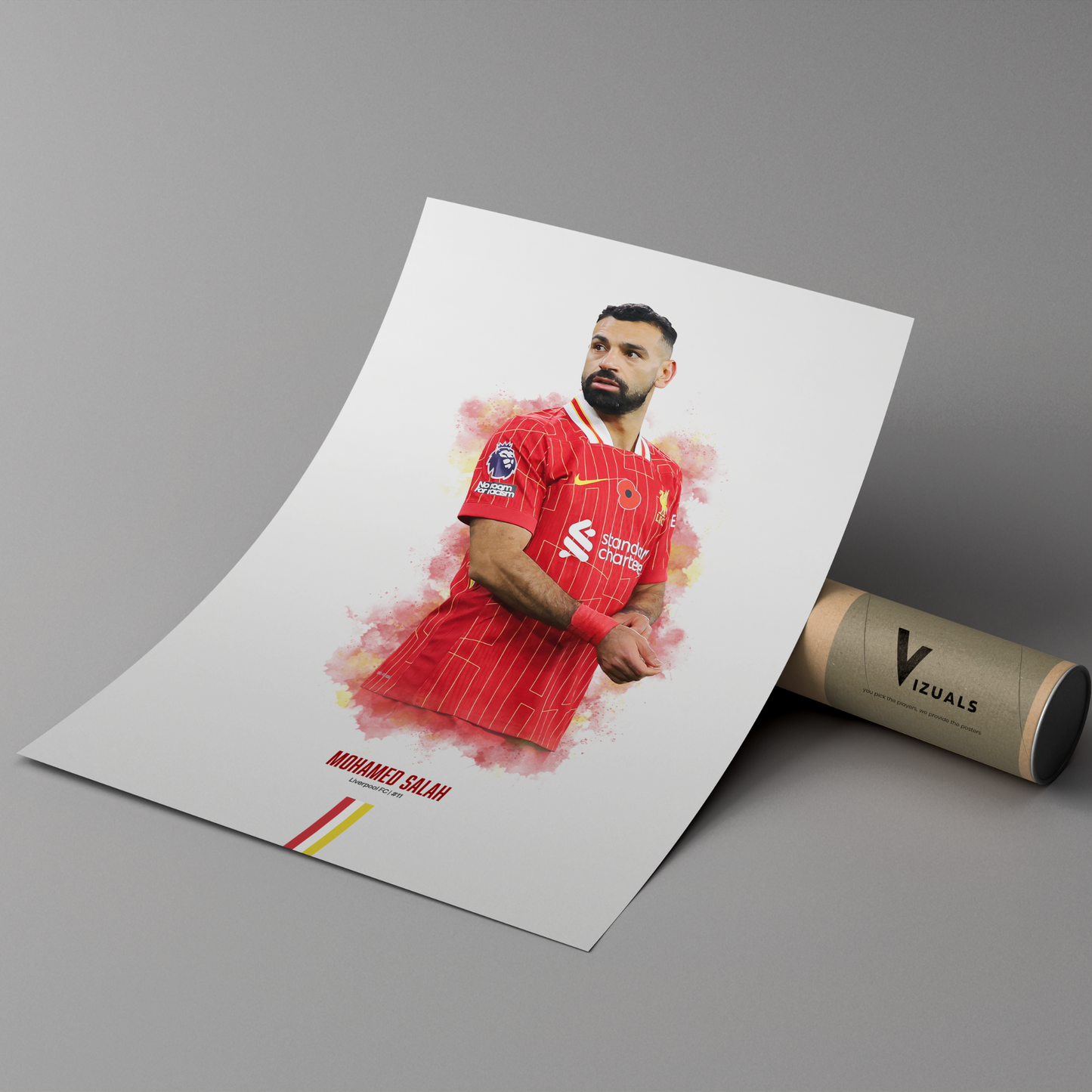 poster mockup leaning on a branded cardboard tube. poster of soccer player mohamed salah playing for Liverpool fc.