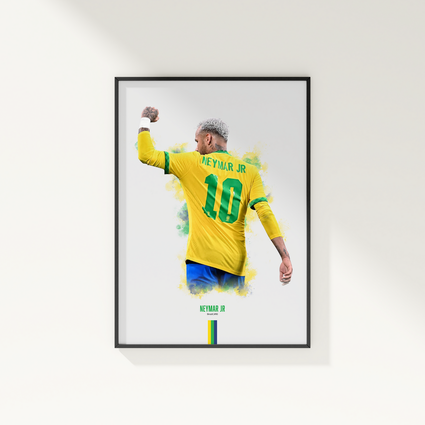 framed poster mockup hanging on a white wall. poster of soccer player Neymar Jr celebrating for Brazil.
