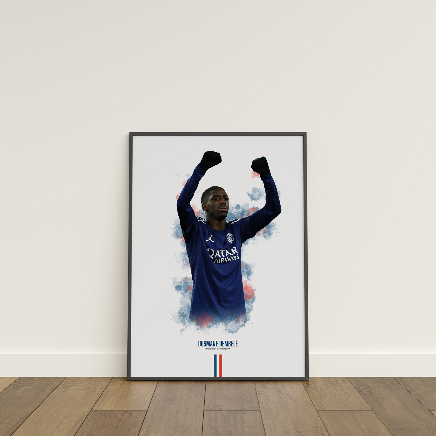 Framed poster print of soccer player Ousmane Dembele, wearing a PSG jersey, on a white wall.
