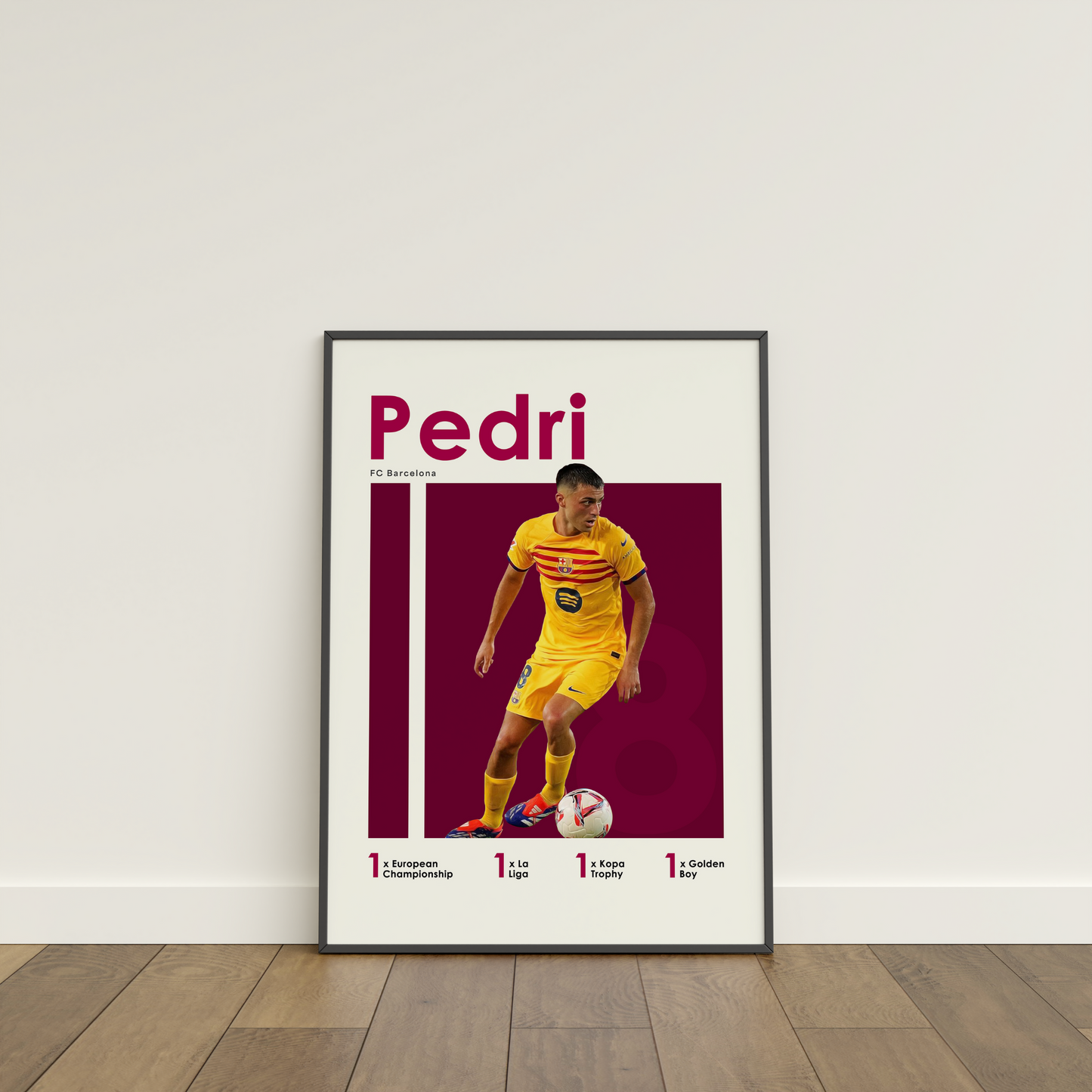 framed poster mockup of soccer player pedri leaning on a white wall