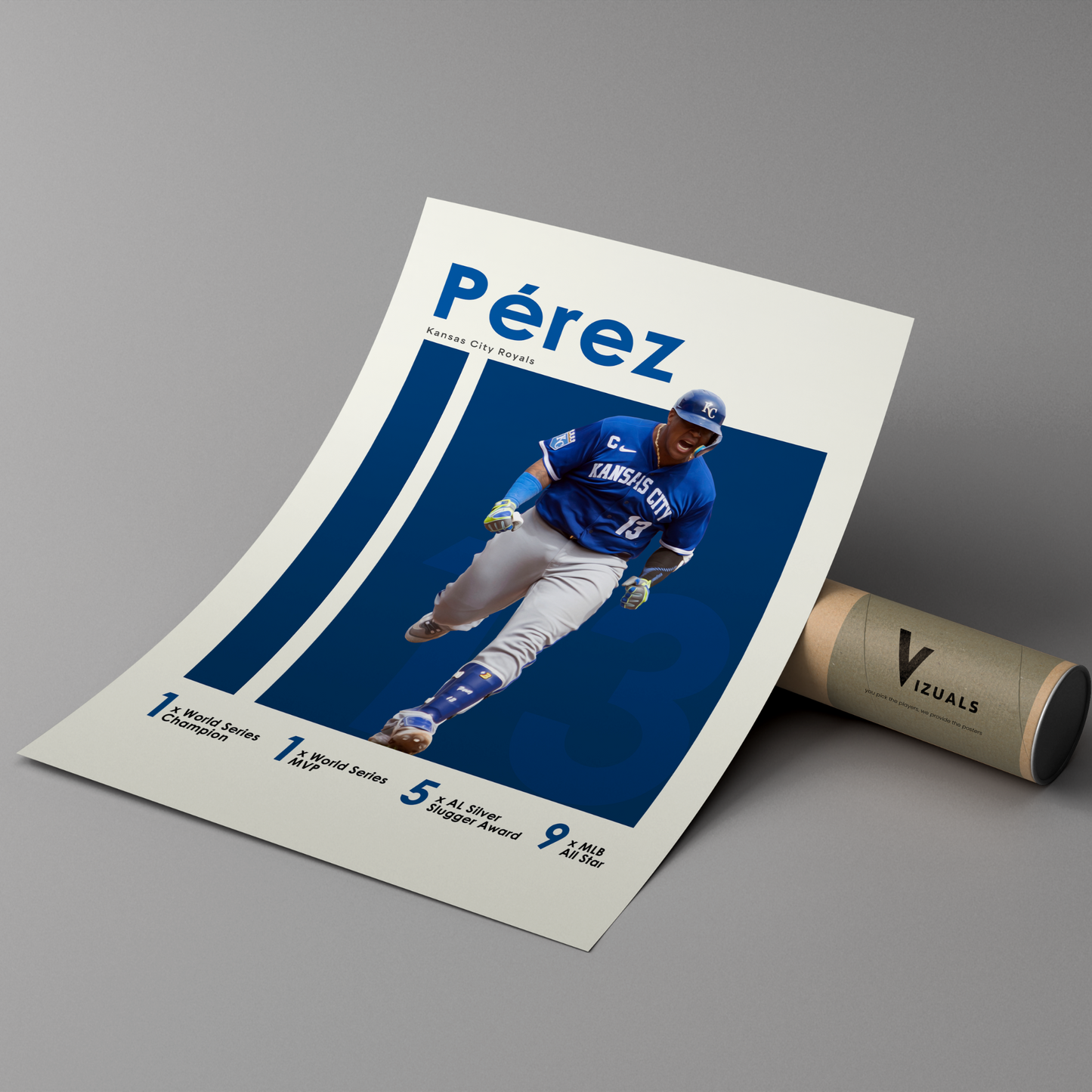 poster mockup leaning on a branded cardboard tube. poster of baseball player salvador perez celebrating for the kansas city royals.