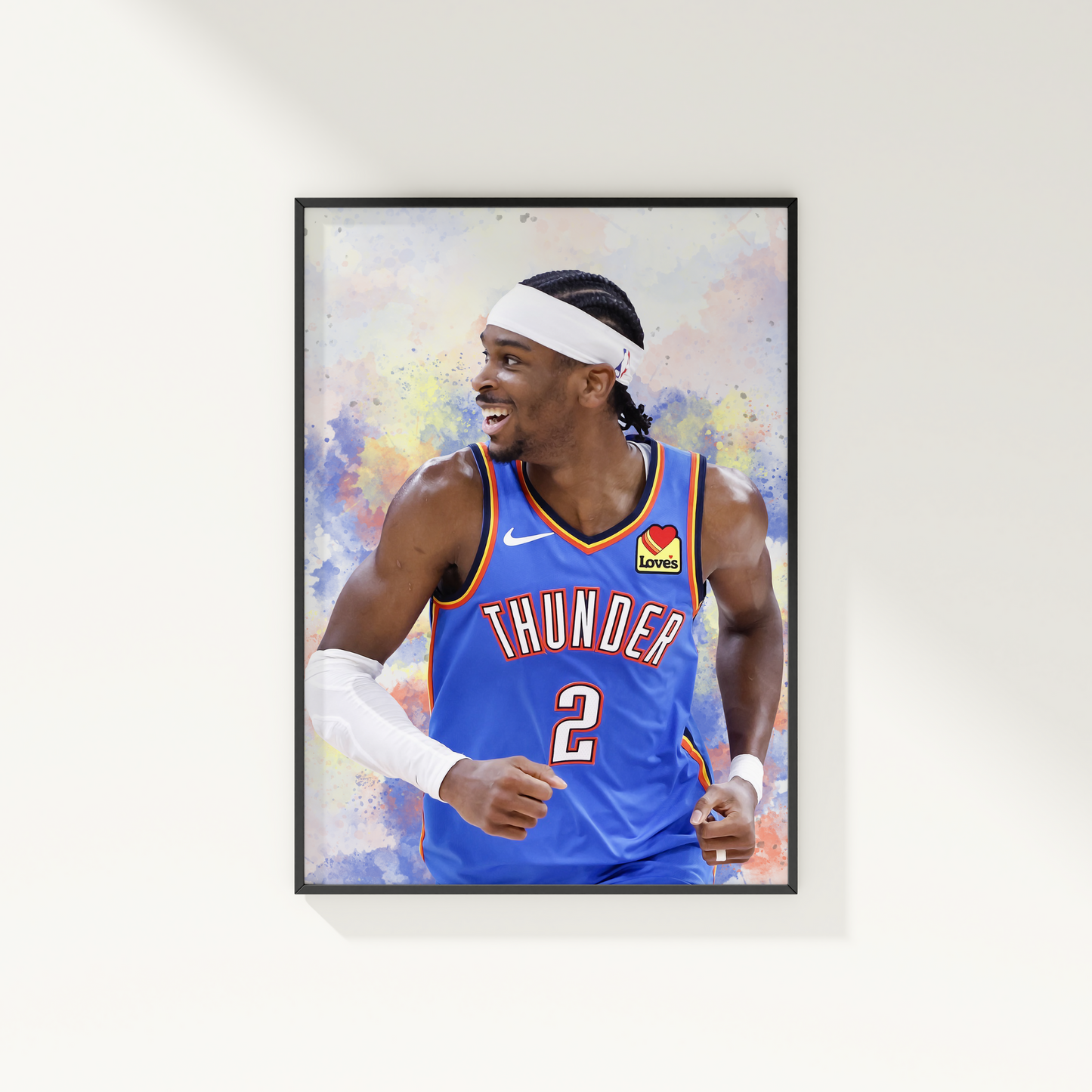 A framed poster of Shai Gilgeous-Alexander in a Thunder basketball uniform, with a colorful abstract design in the background.