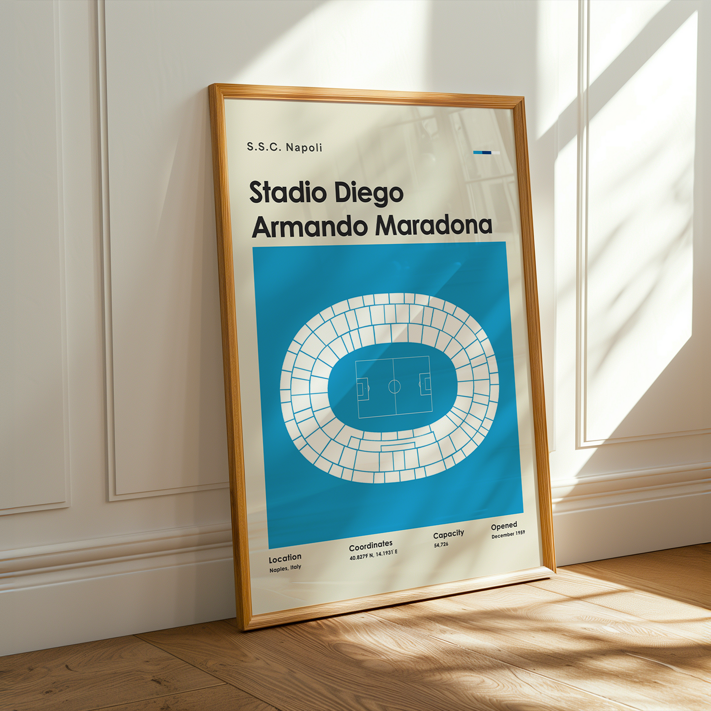 Framed poster of Stadio Diego Armando Maradona with a blue and white design, leaning against a wall.