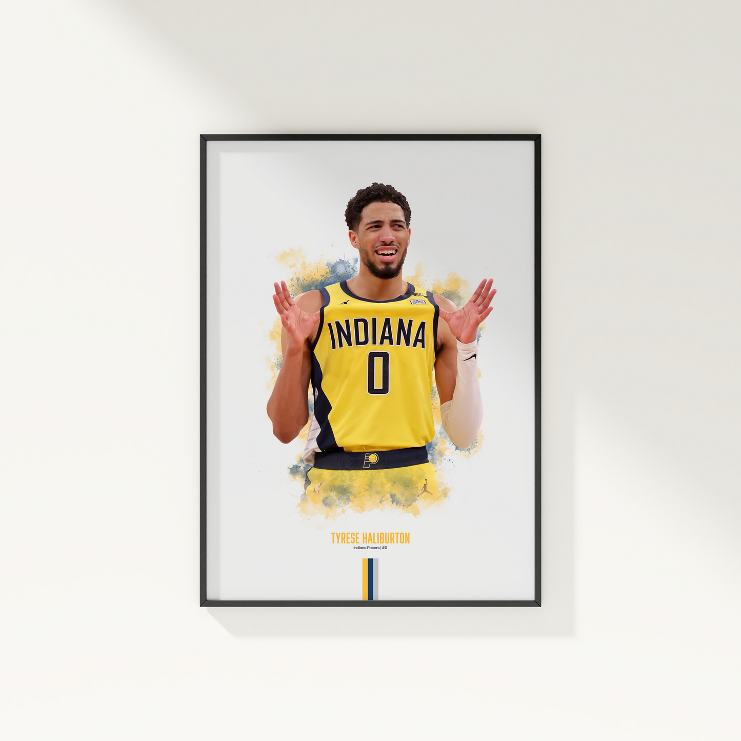 framed poster mockup hanging on a white wall. poster of basketball player tyrese haliburton celebrating for the indiana pacers.