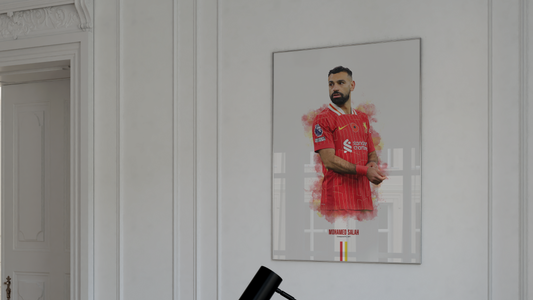 framed poster mockup of soccer player mo salah wearing a Liverpool jersey