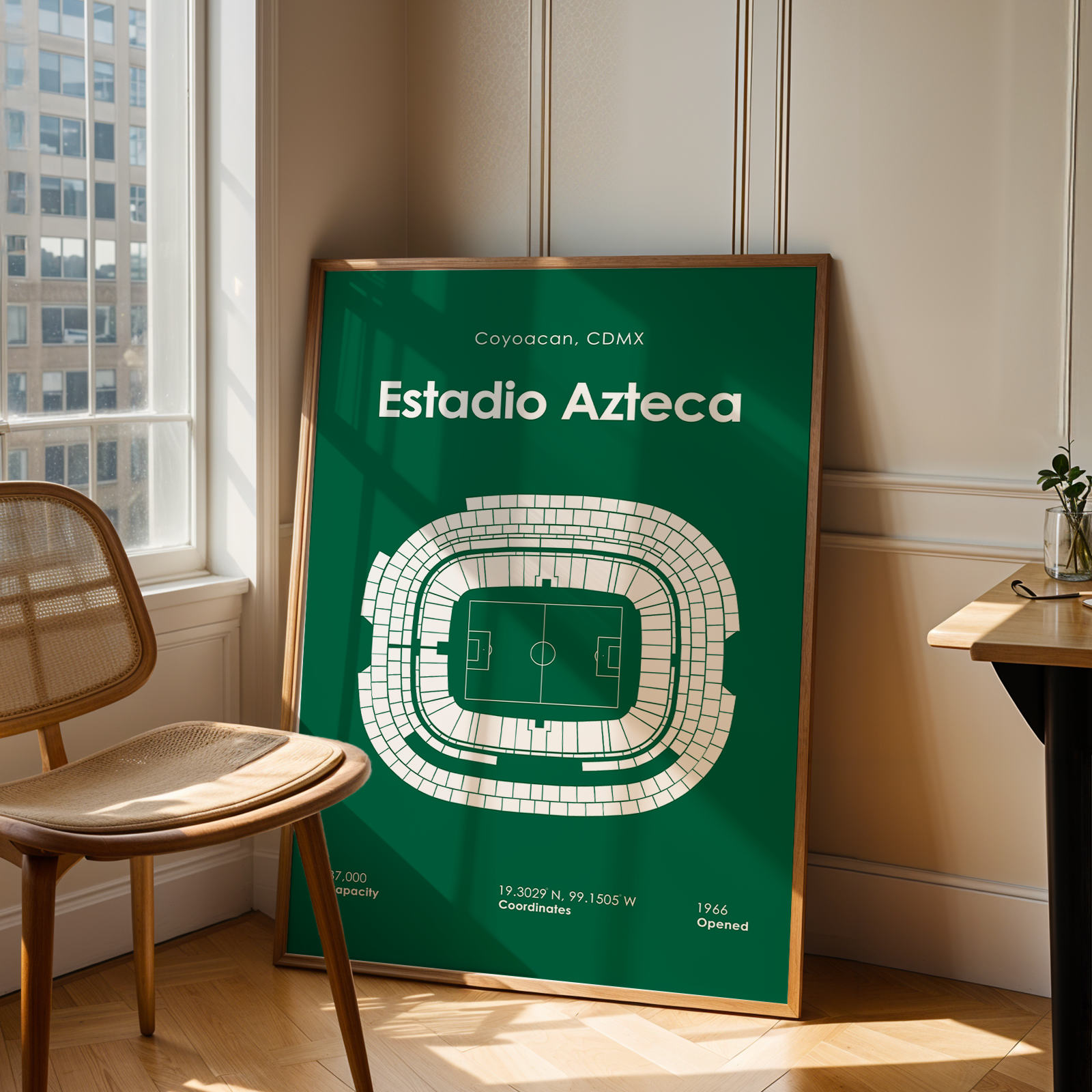 Poster of Estadio Azteca in a room with a chair and table.