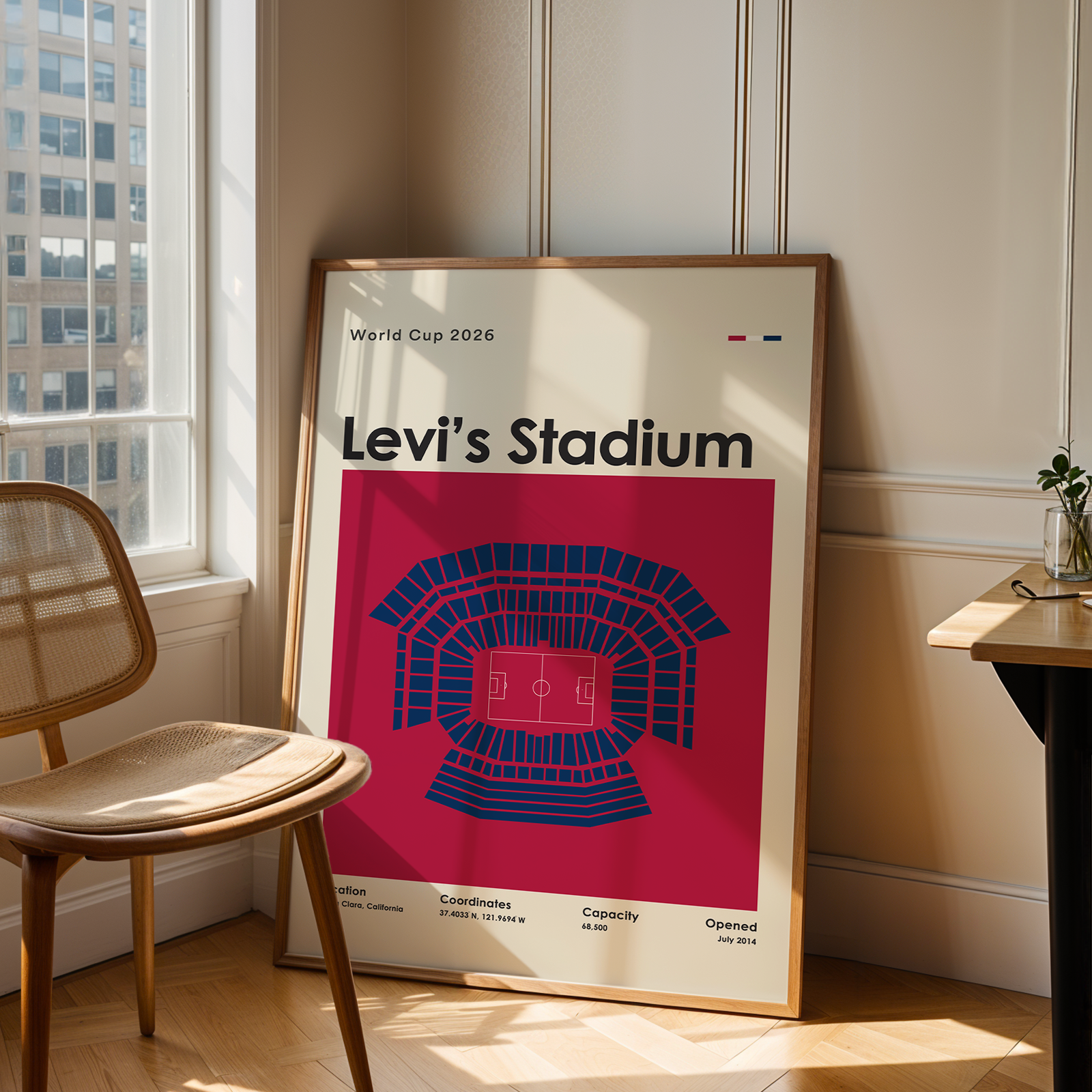 Levi's Stadium poster in a room with a chair and table.