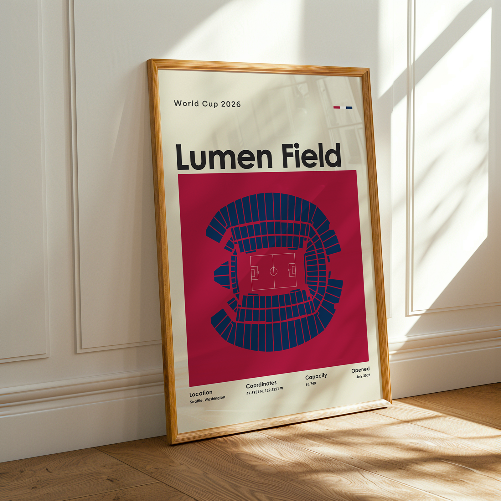 Framed poster of Lumen Field with seating chart on a wooden floor.