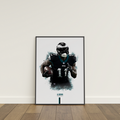 framed poster mockup of football player aj brown leaning on a white wall