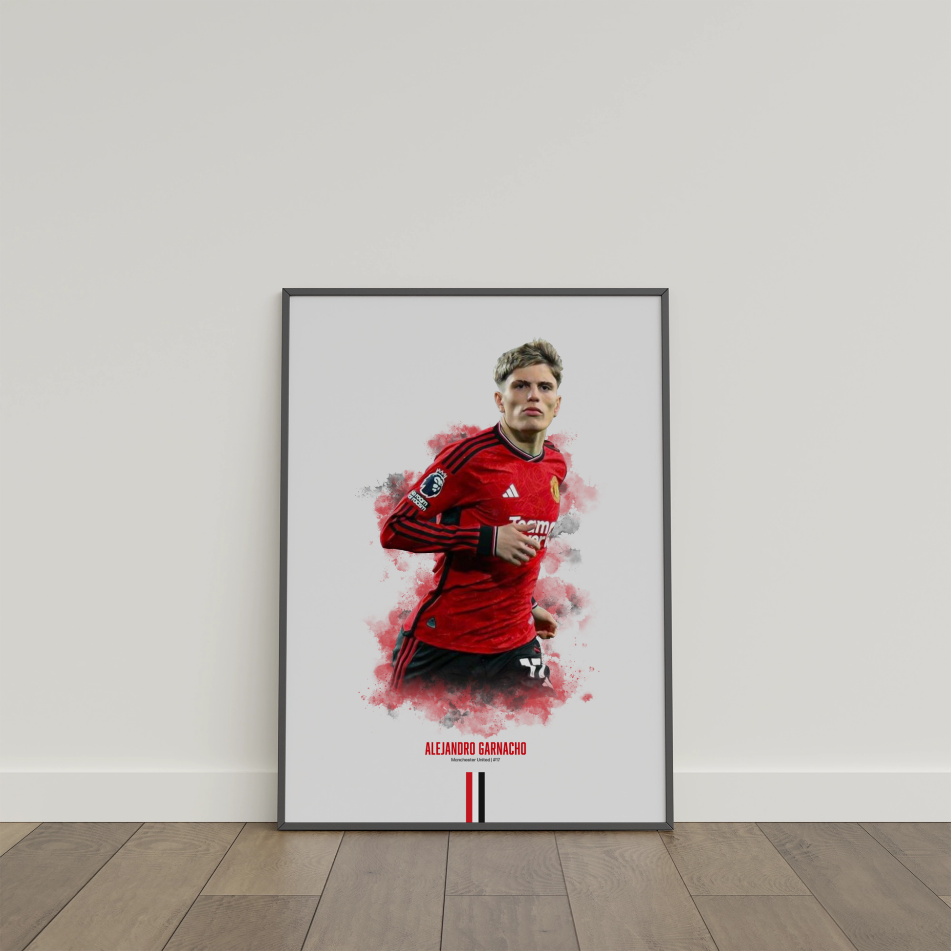 framed poster mockup of soccer player alejandro garnacho leaning on a white wall