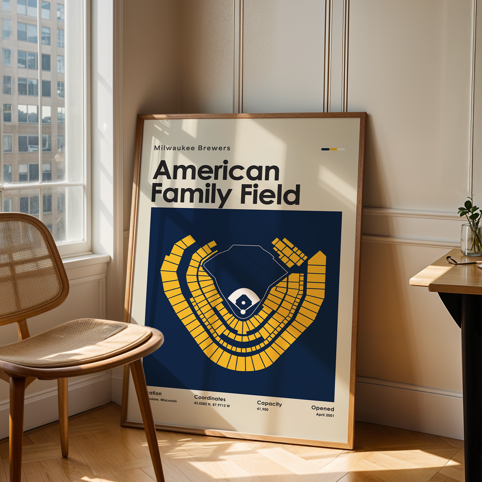 Poster of American Family Field in a room with a chair and table.