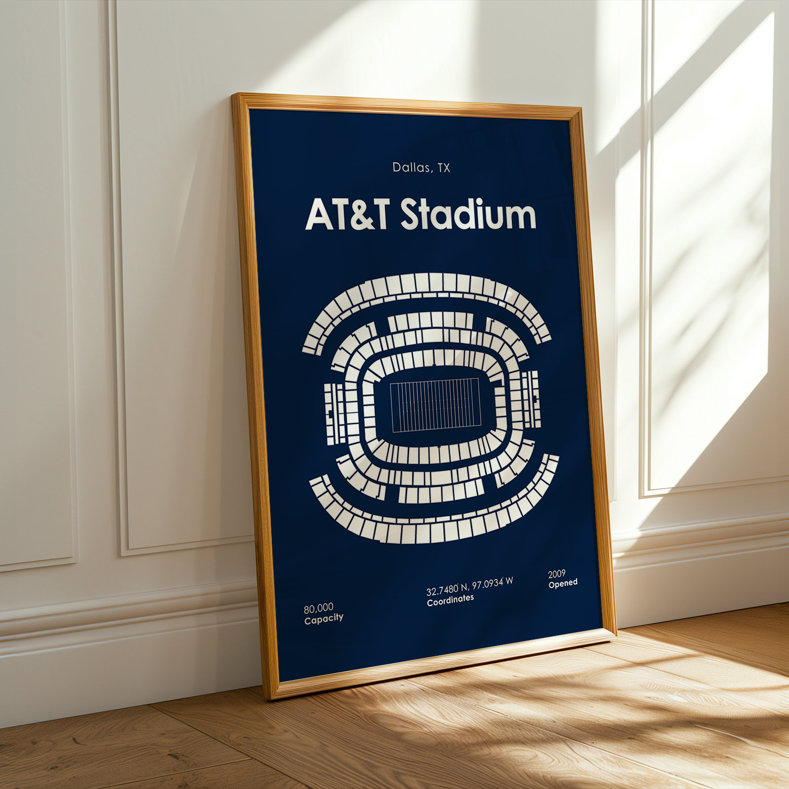 Framed poster of AT&T Stadium layout on a wall