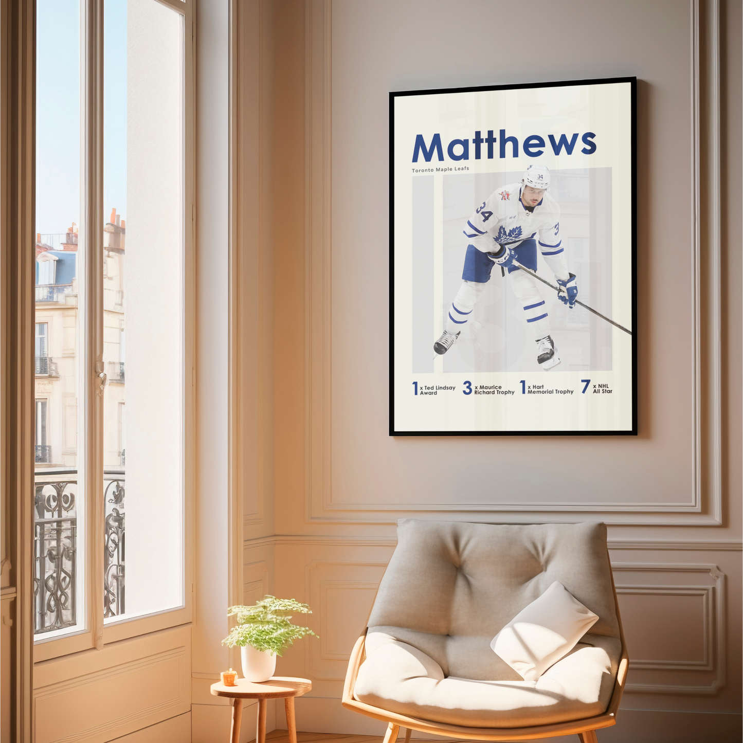 framed poster mockup of hockey player auston matthews hanging in a living room