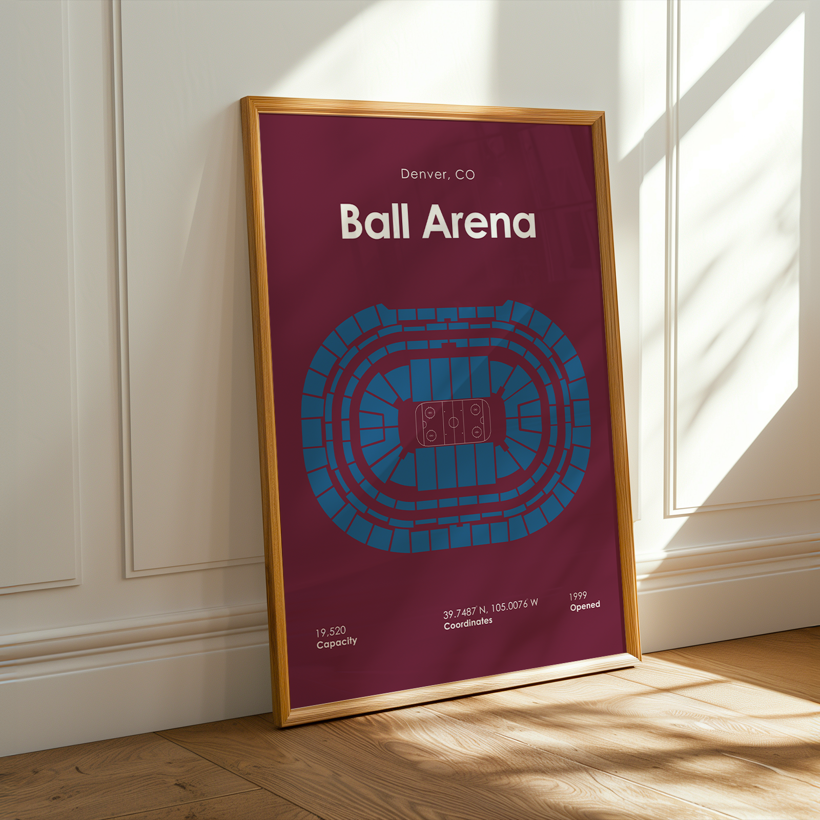 Framed poster of Ball Arena in Denver, CO on a wall.