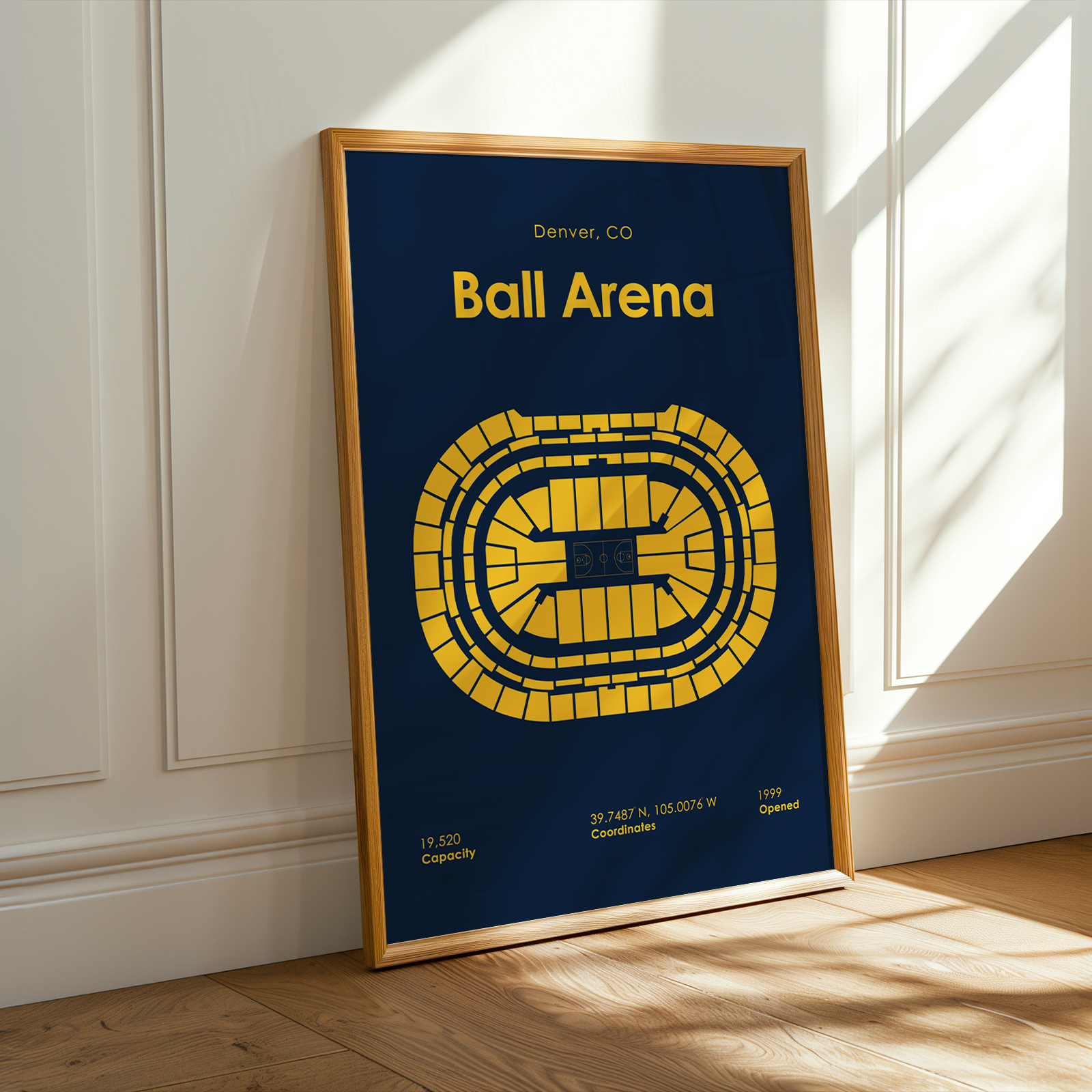 Framed poster of Ball Arena in Denver, CO on a wall.