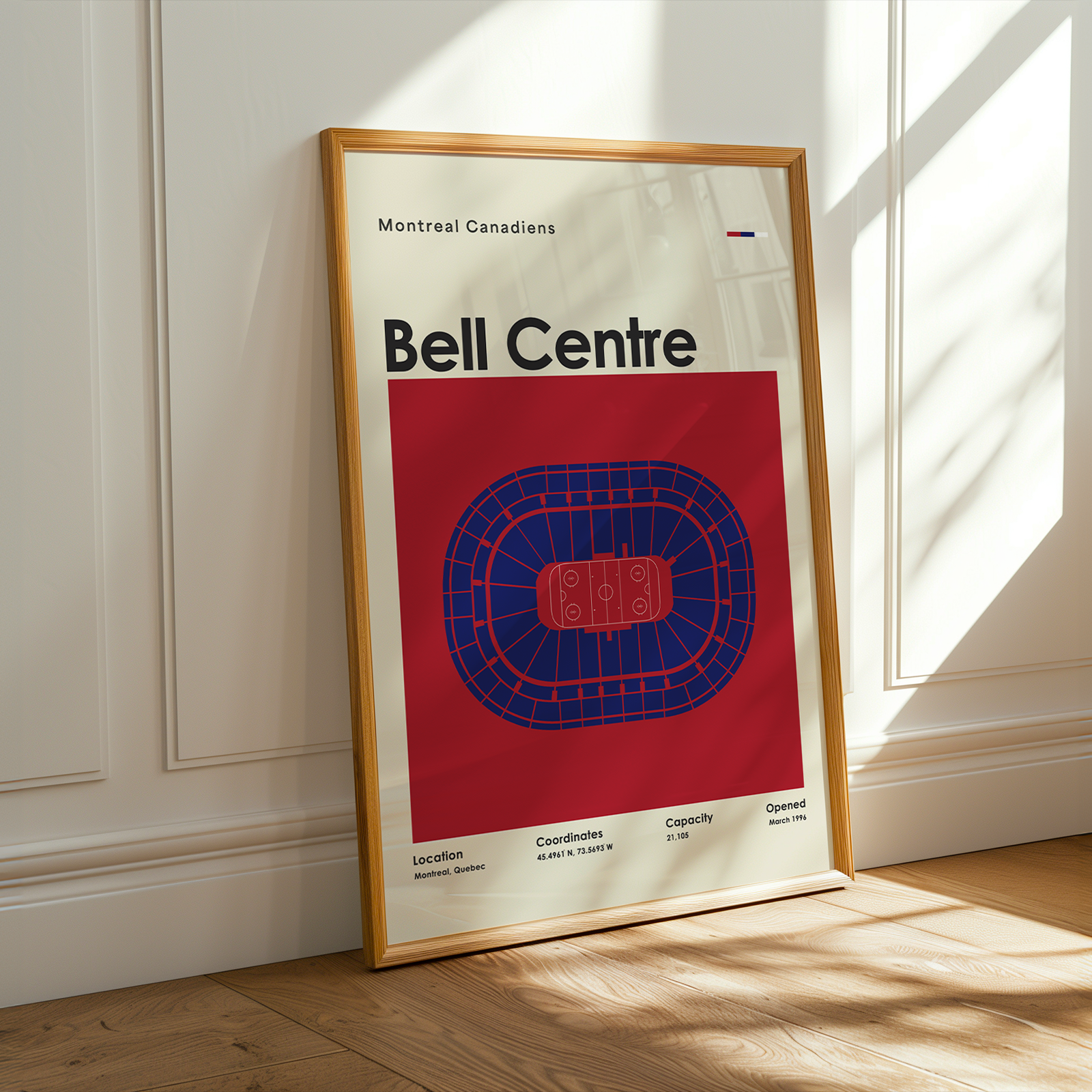 Framed poster of Bell Centre with Montreal Canadiens branding on a wall.
