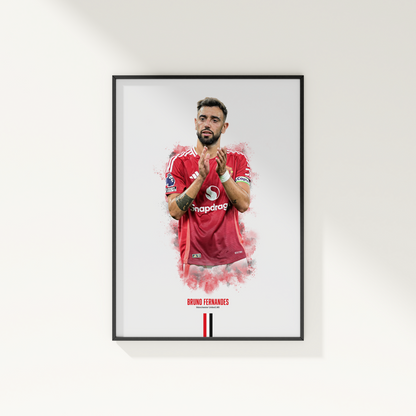 framed poster mockup of soccer player bruno fernandes hanging on a white wall