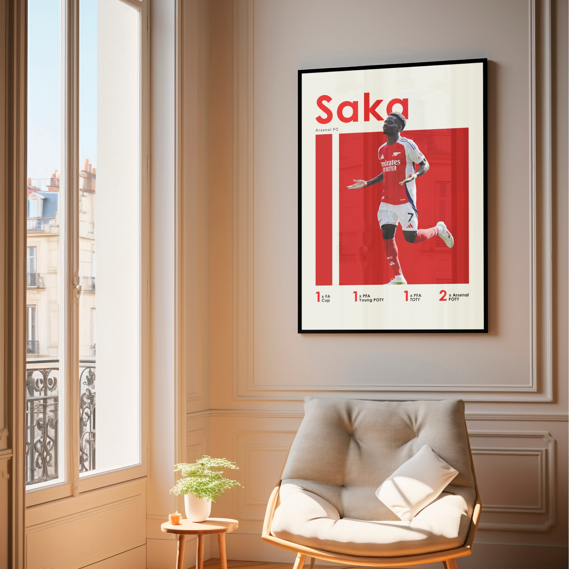 framed poster mockup of soccer player bukayo saka hanging in a living room