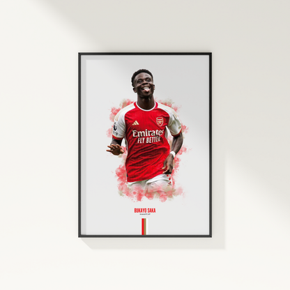 framed poster mockup of soccer player bukayo saka hanging on a white wall