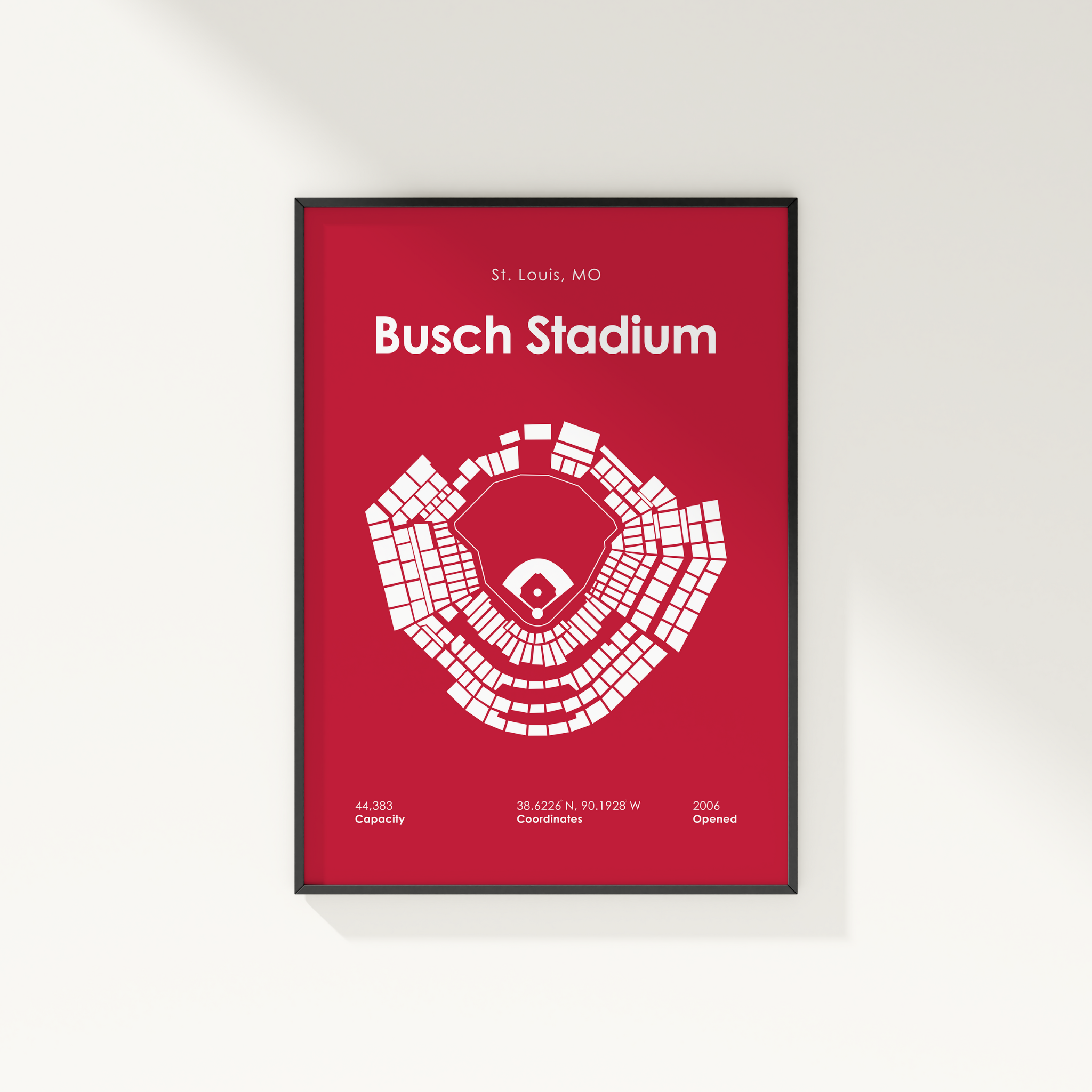 Framed poster of Busch Stadium layout on a red background
