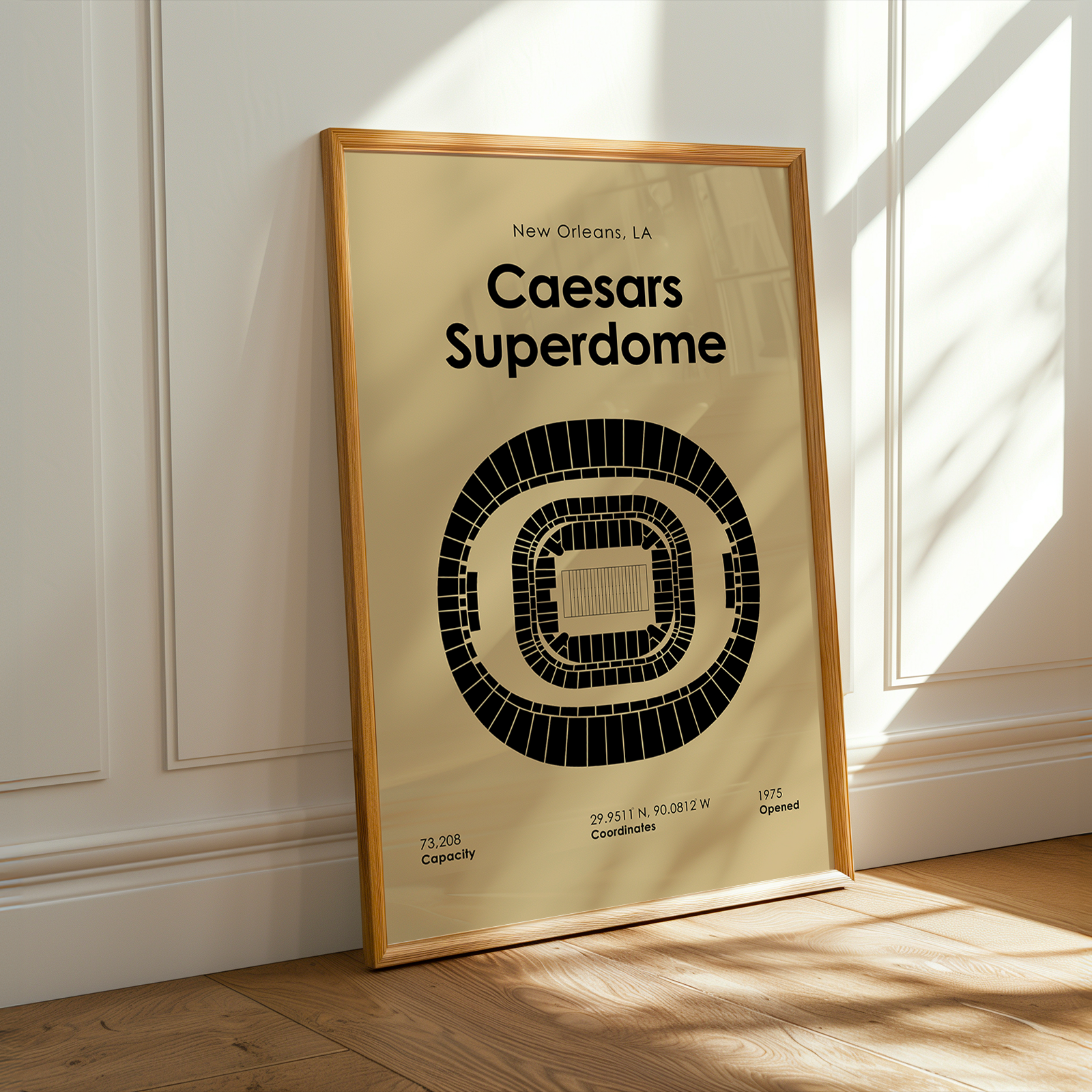 Framed poster of Caesars Superdome layout on a wall.