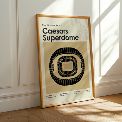 Framed poster of Caesars Superdome on a wall with sunlight casting shadows.