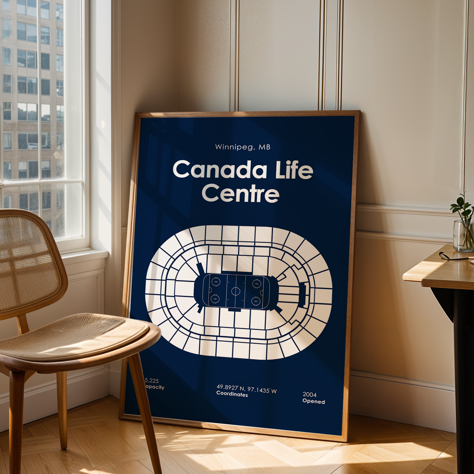 Framed map of Canada Life Centre in Winnipeg, MB on a wall.