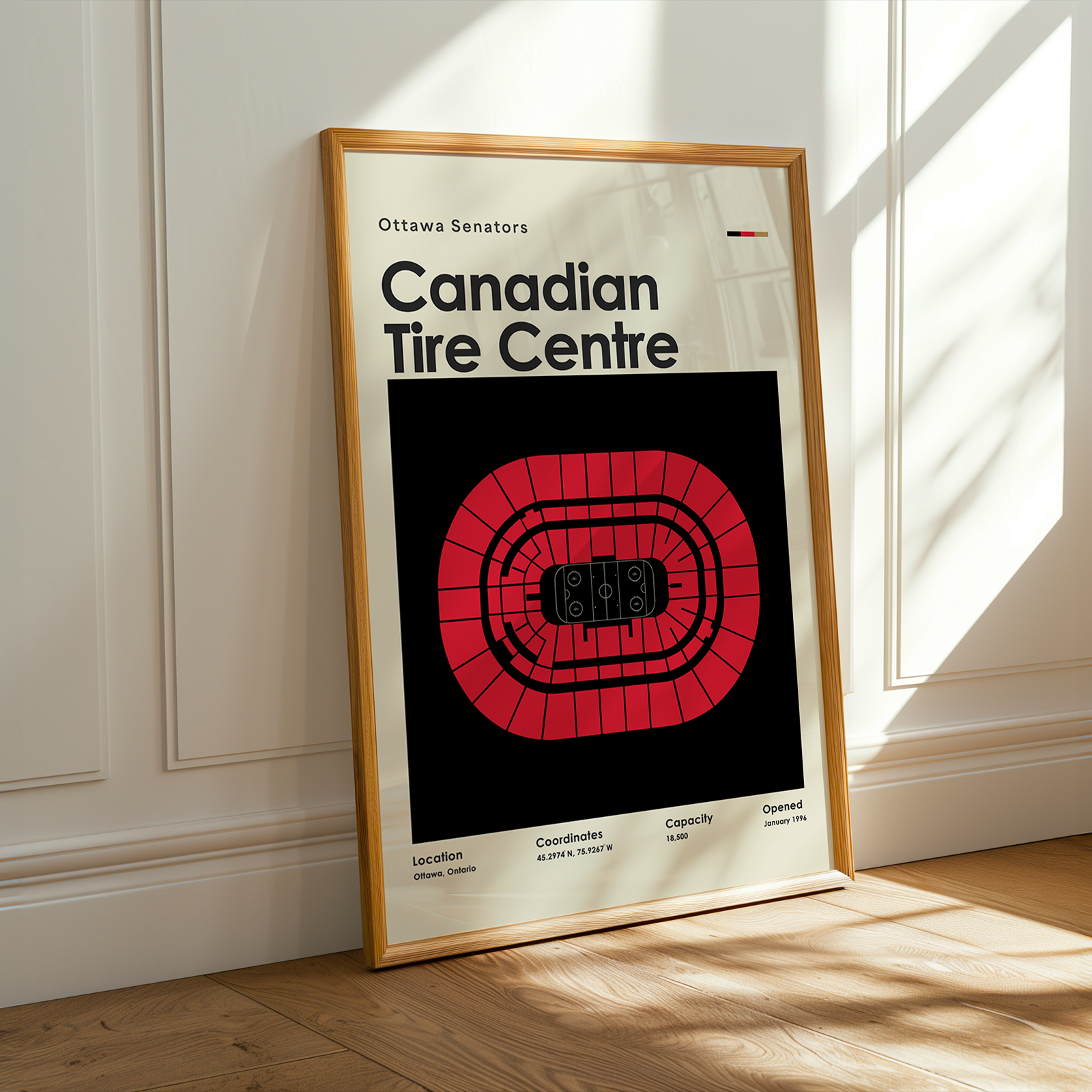 Framed poster of Canadian Tire Centre with Ottawa Senators logo on a wall.