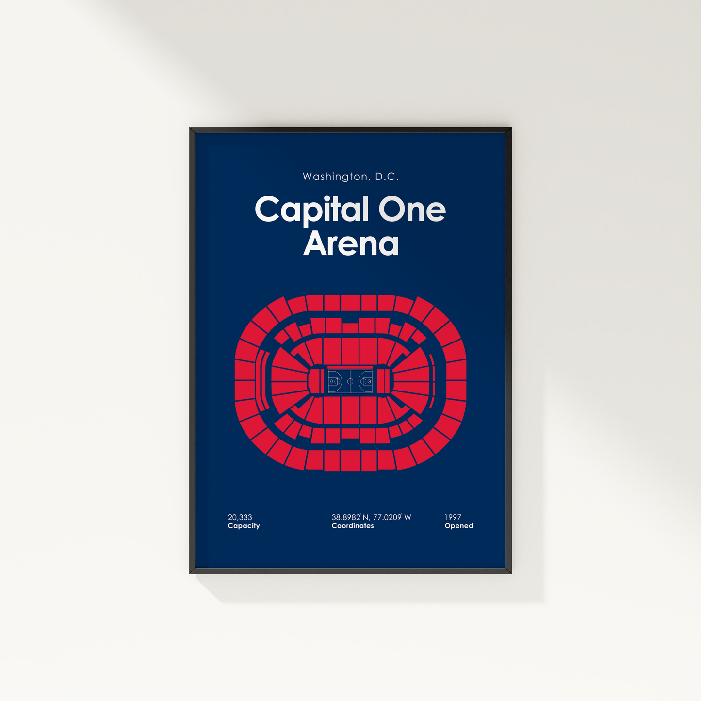 Framed poster of Capital One Arena layout with red seating diagram on a blue background