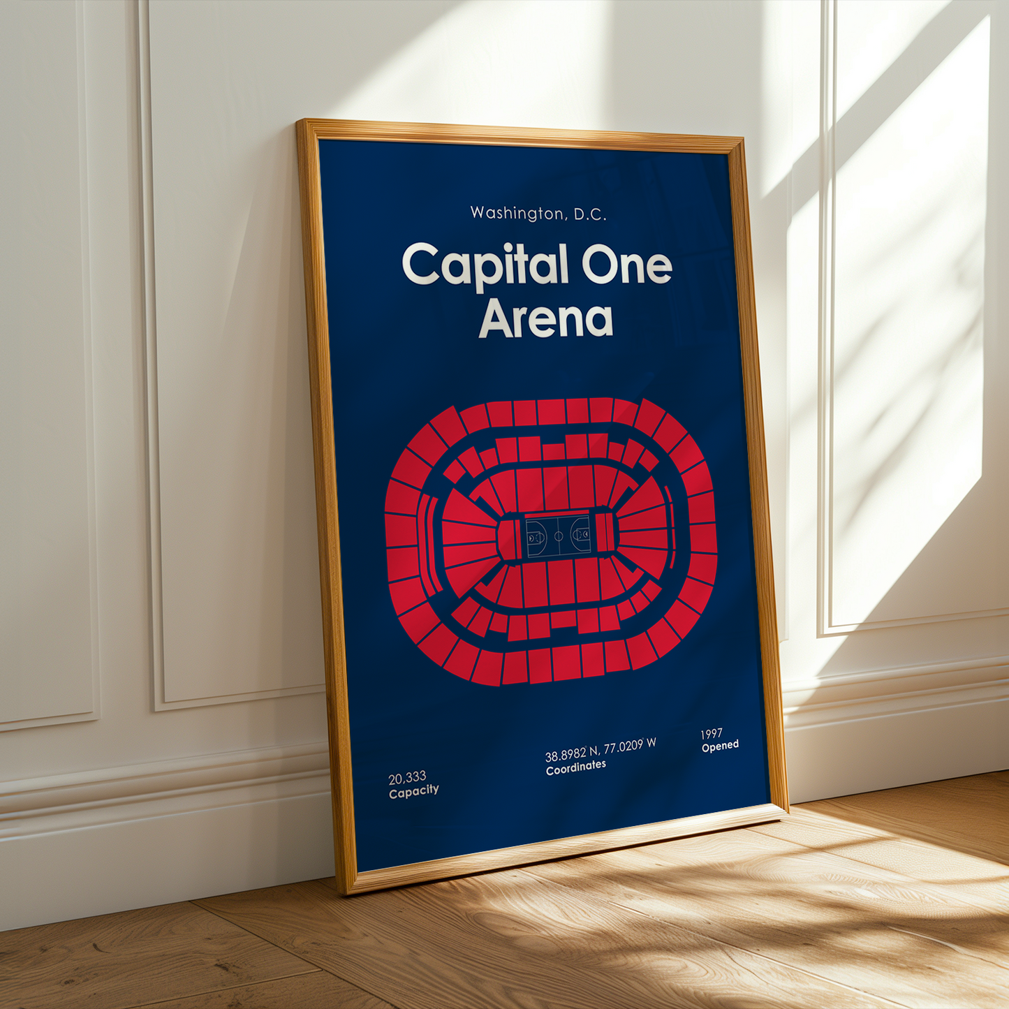 Framed poster of Capital One Arena in Washington, D.C. on a wall.