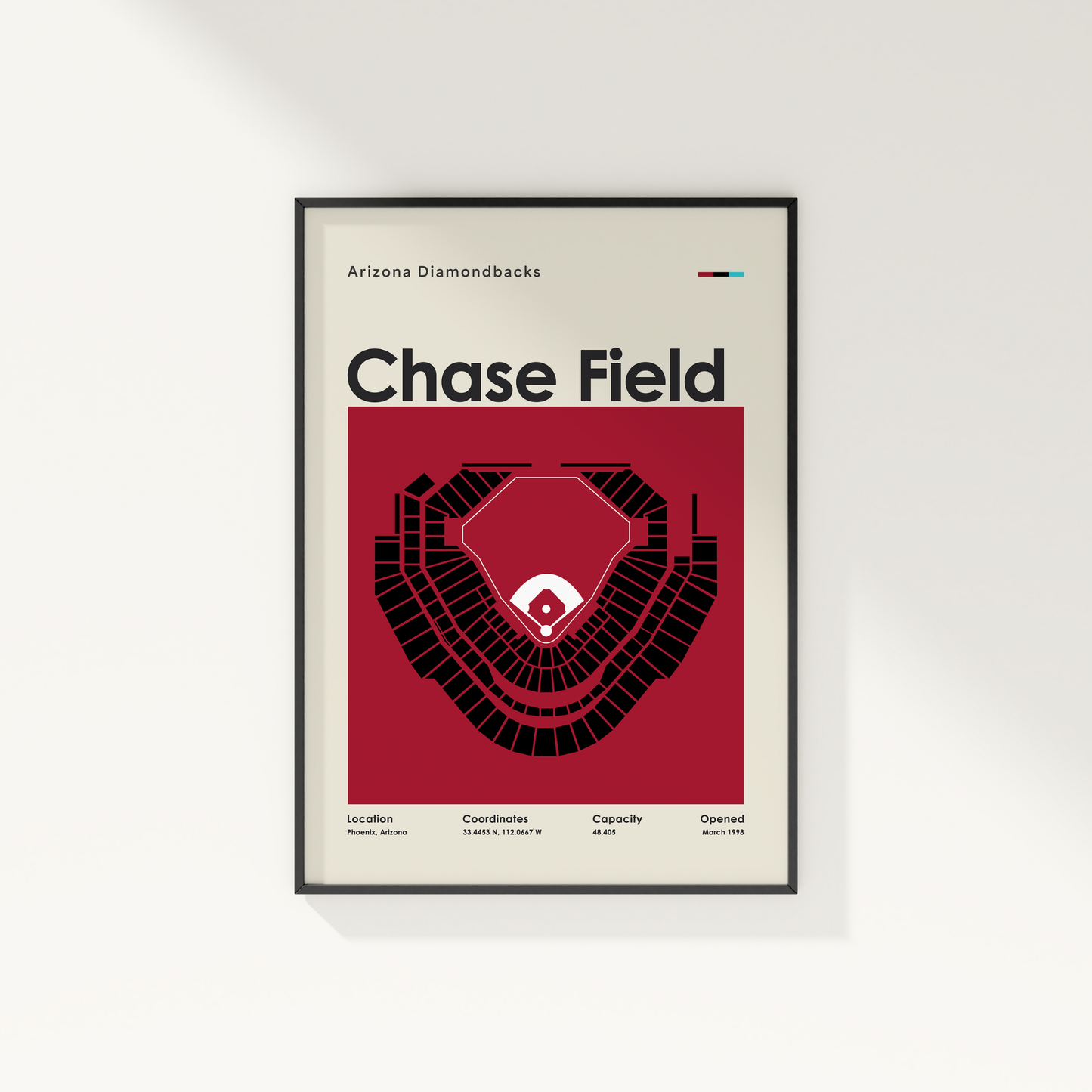 Framed poster of Chase Field with Arizona Diamondbacks branding on a white wall.