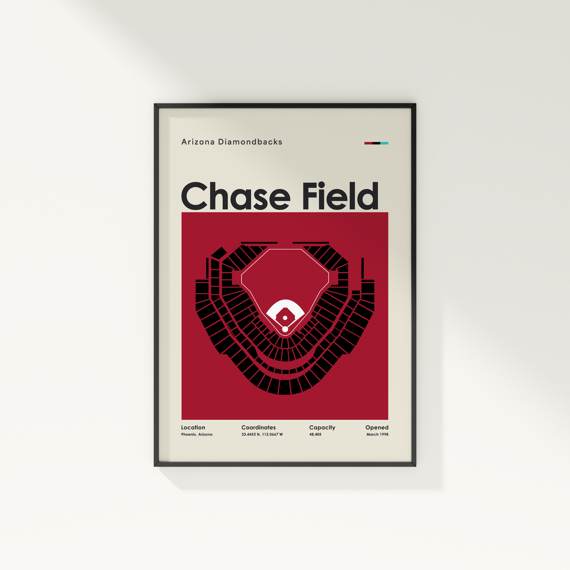 Framed poster of Chase Field with Arizona Diamondbacks branding on a white wall.